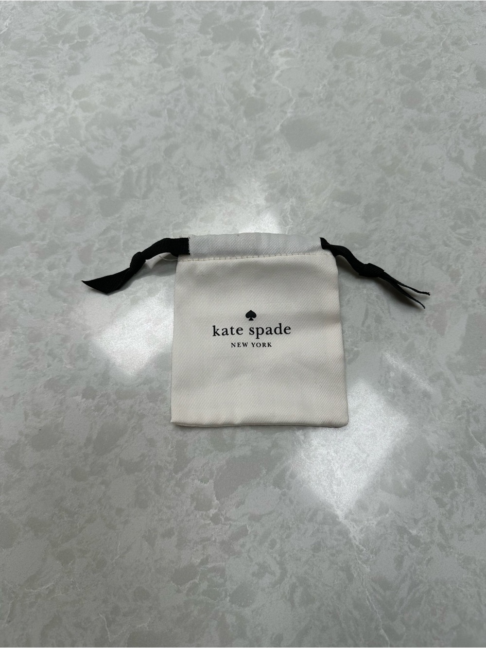 kate spade White Pouch with Black Drawstring
